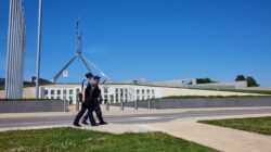 Australian Federal Police officers patrol Parliament House, Canberra, Australia. | Newsreel