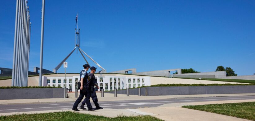 Australian Federal Police officers patrol Parliament House, Canberra, Australia. | Newsreel