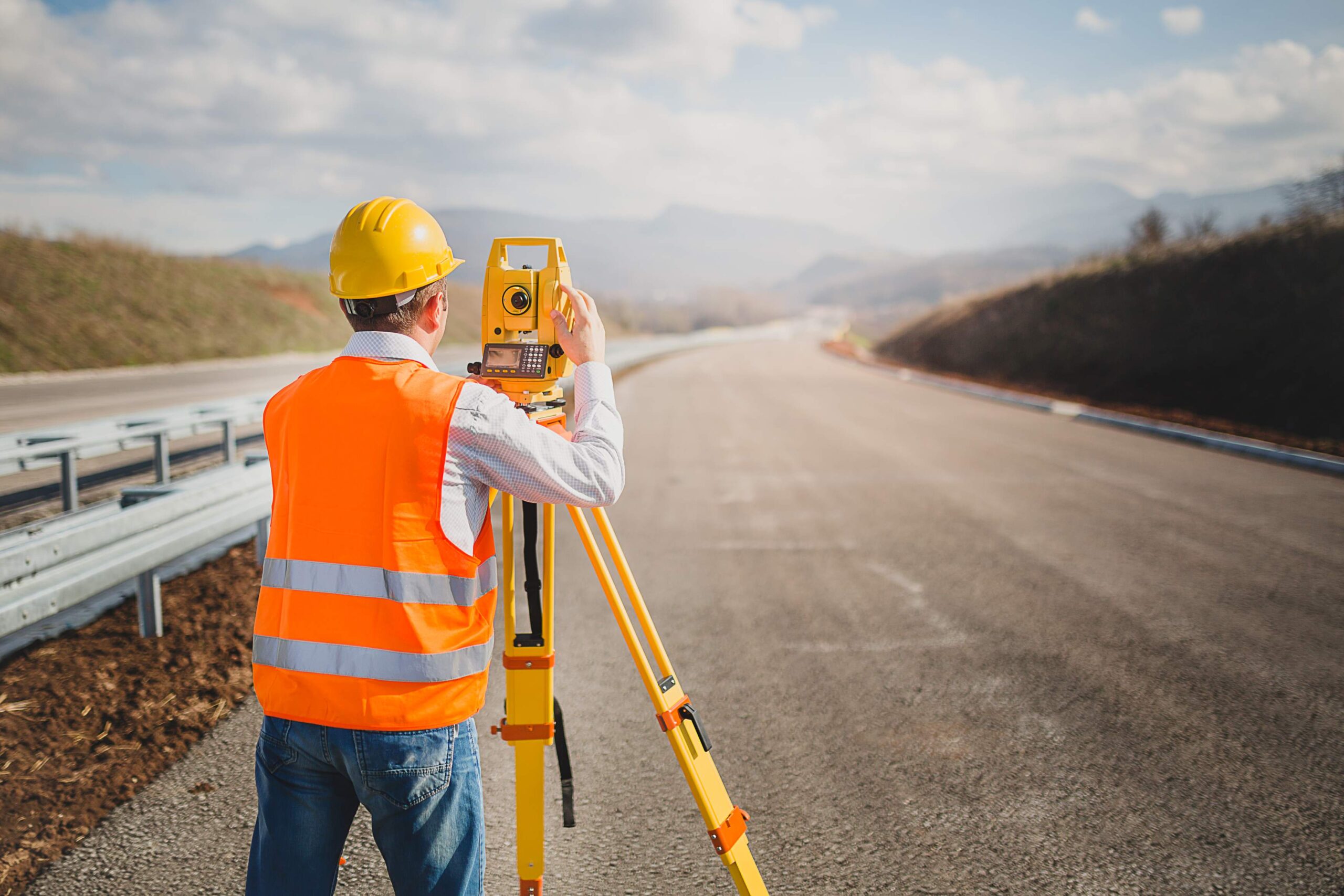 Surveyor on road. | Newsreel