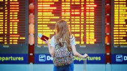 Traveller at airport. | Newsreel