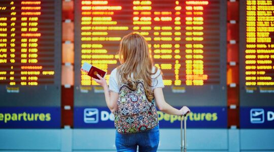 Traveller at airport. | Newsreel