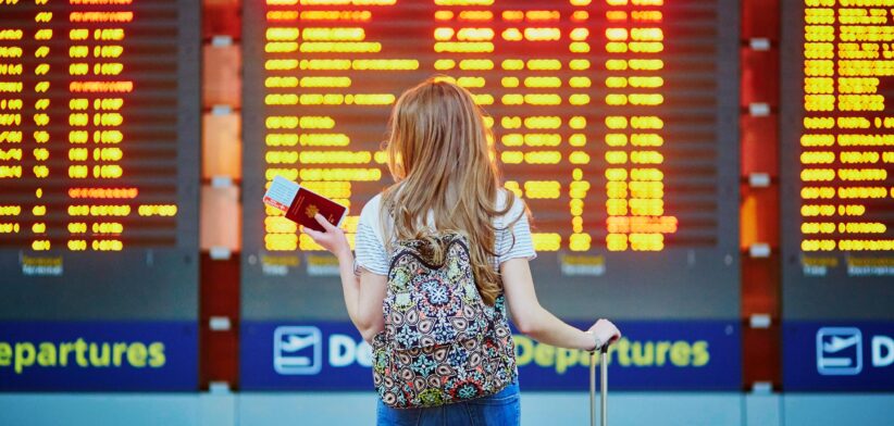 Traveller at airport. | Newsreel