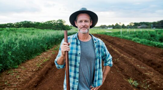 Farmer in field. | Newsreel