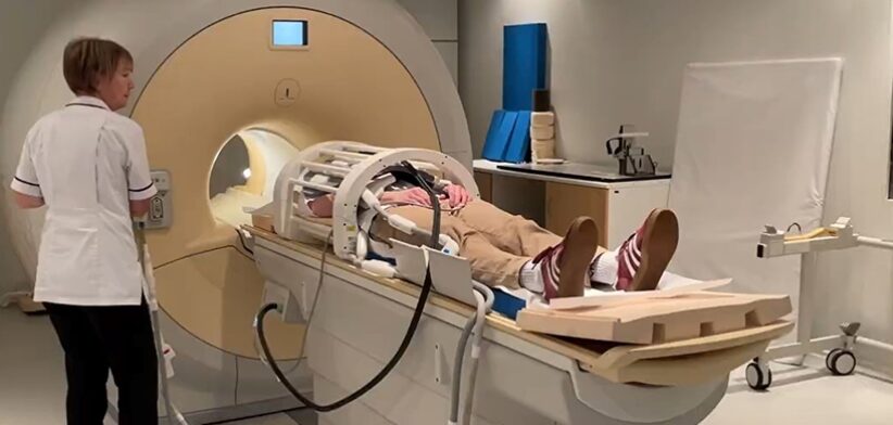 Person set to undertake MRI scan. | Newsreel