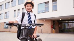 School student cycling. \ Newsreel