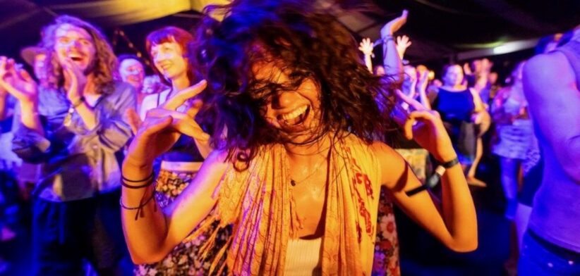 Woman dancing at Woodford Folk Festival. | Newsreel