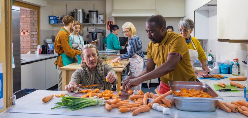 Workers in a community kitchen. | Newsreel