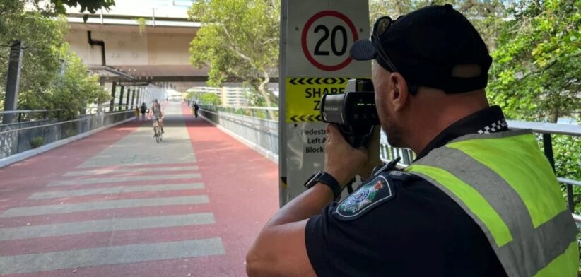 Brisbane police with speed camera on e-scooter. | Newsreel