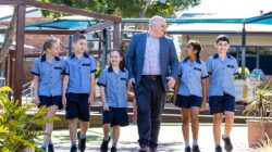 Principal Michael McInerney with students at St Peter's Primary School Rochedale. | Newsreel