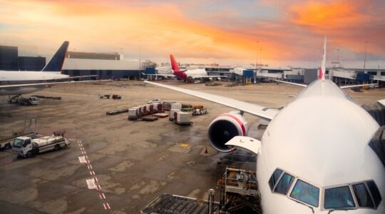 Airport scene at sunset. | Newsreel