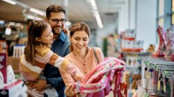 Family shopping for school backpack. | Newsreel