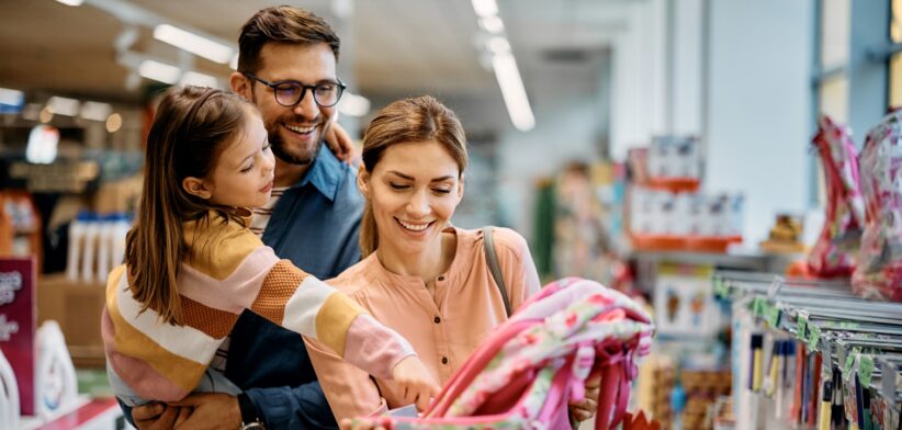 Family shopping for school backpack. | Newsreel