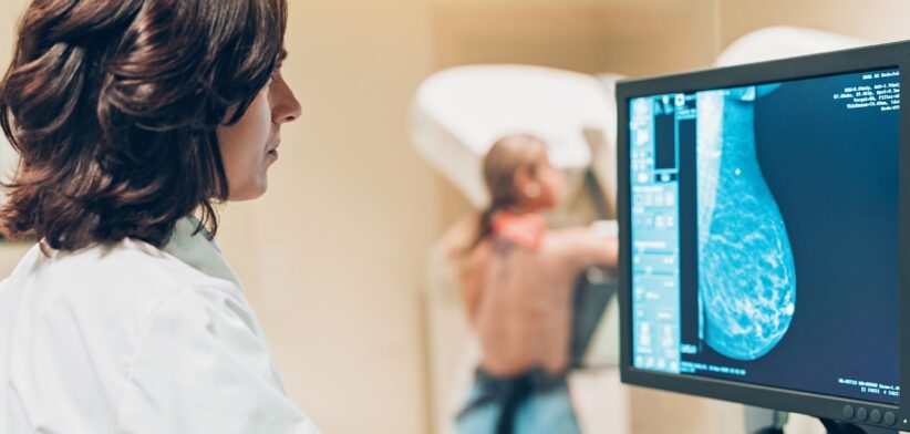 Doctor and patient at breast screening. | Newsreel