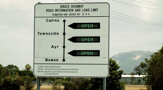 Bruce Highway sign. | Newsreel