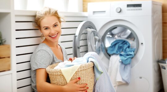 Woman washing clothes. | Newsreeel