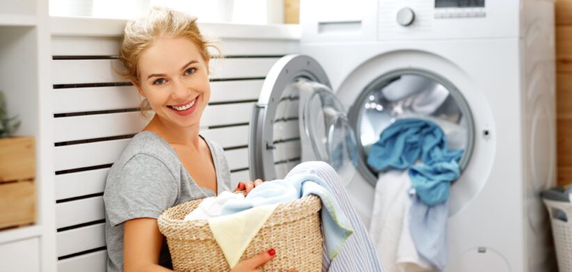 Woman washing clothes. | Newsreeel