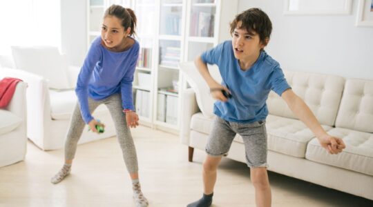 Children using dance video game. | Newsreel