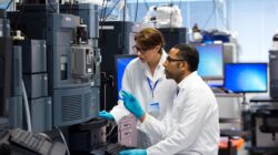 Two researchers in lab. | Newsreel