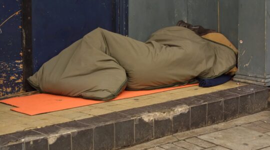 Person sleeping rough. | Newsreel