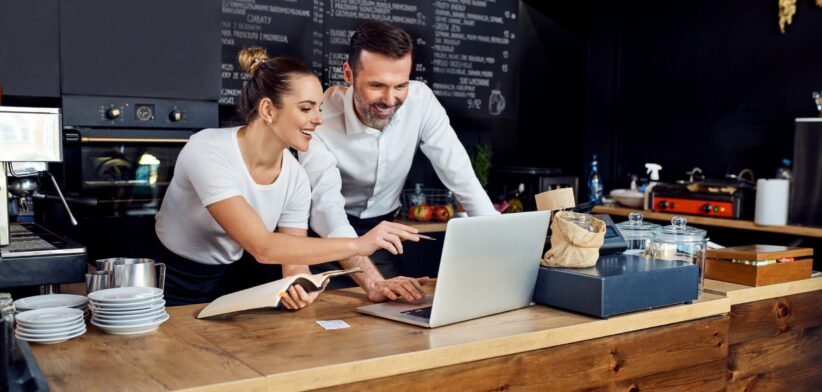 Small business owners on computer. | Newsreel