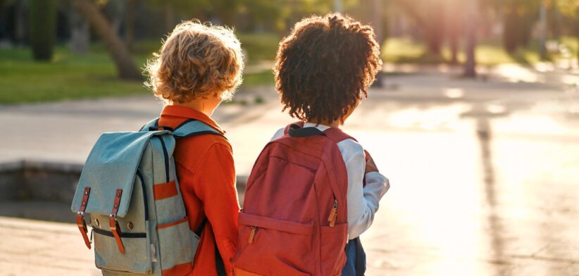 Young children walking to school. | Newsreel