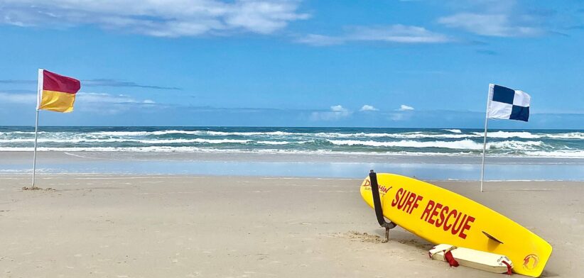 Flag on surf beach