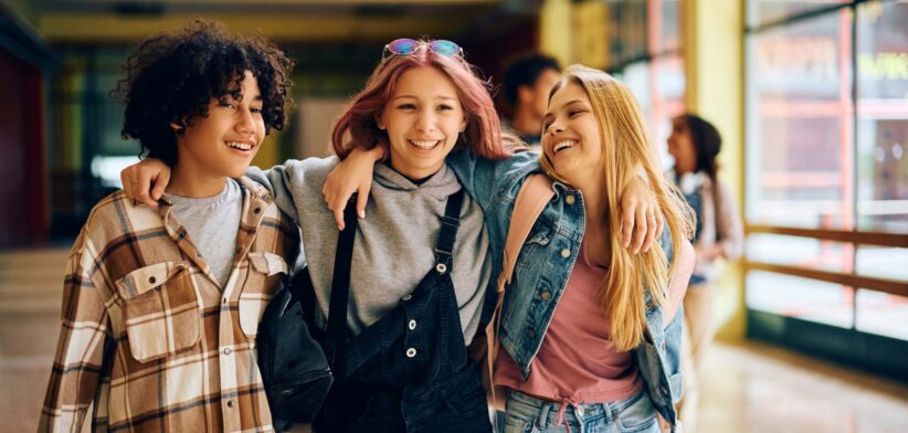 Teenagers laughing. | Newsreel