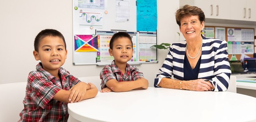 St Flannan’s School Zillmere Principal Cheryl Bell and students. | Newsreel