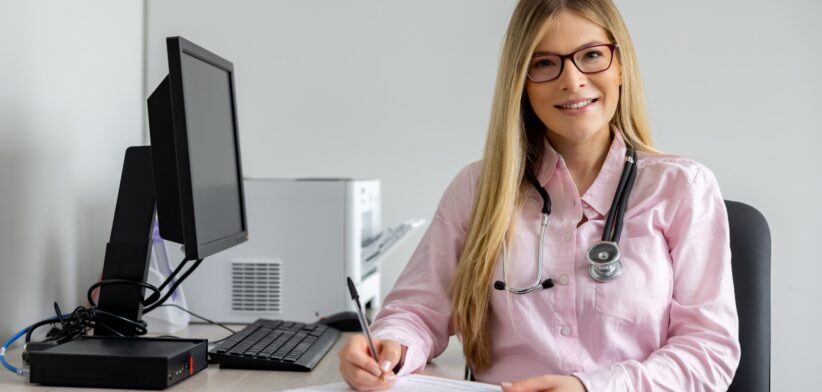 Doctor in her office. | Newsreel