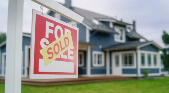 House sold sign. | Newsreel