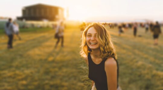 Young woman at music festival. | Newsreel