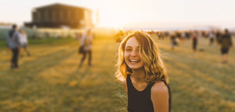 Young woman at music festival. | Newsreel