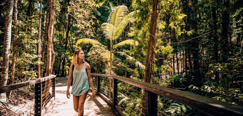 Woman walking in Queensland rainforest, Australia. | Newsreel