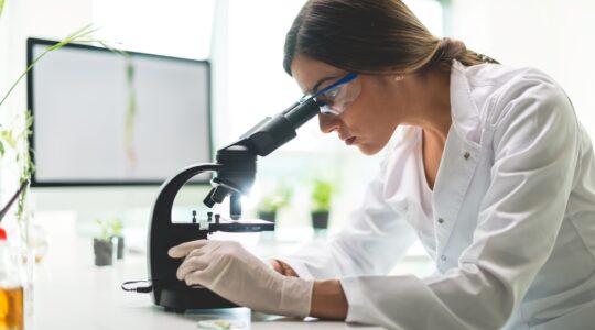 Researcher in lab. | Newsreel