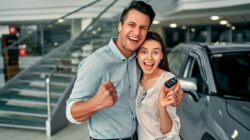 Couple buying a new car. | Newsreel