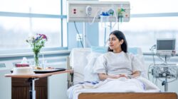 Woman in hospital room. | Newsreel