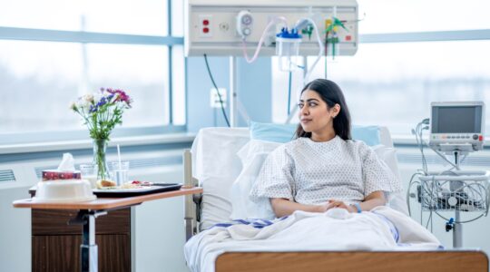 Woman in hospital room. | Newsreel