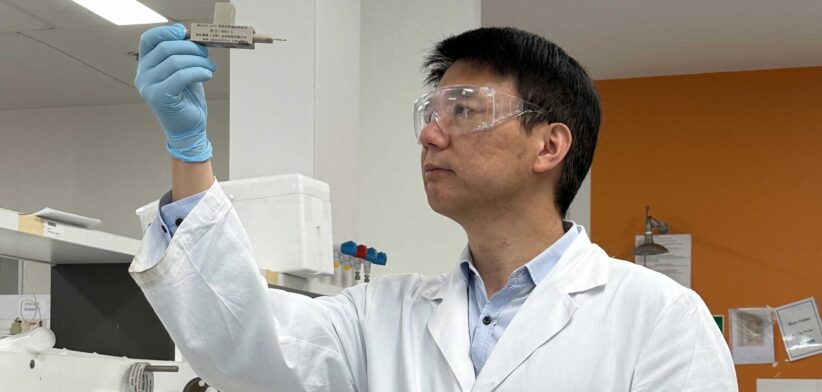 Professor Chuan Zhao with battery. | Newsreel