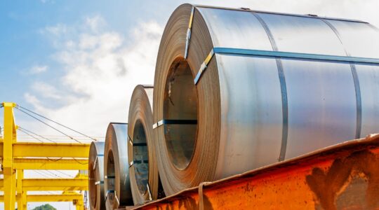 Rolls of steel on back of truck