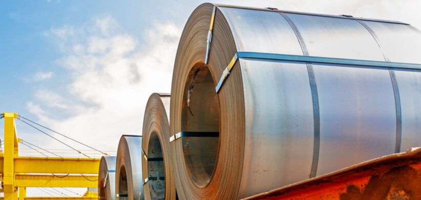 Rolls of steel on back of truck