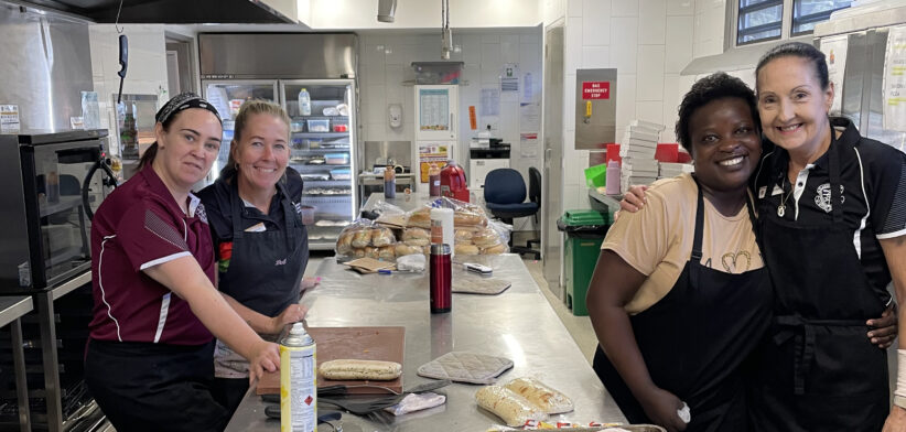 Clairvaux MacKillop College Curriculum Hospitality support staff and Douce (second from the right)