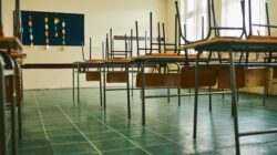 Classroom with chairs on desks. | Newsreel