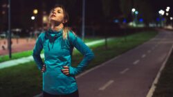 Woman exercising at night. | Newsreel