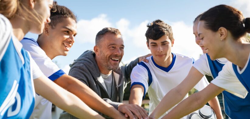 Soccer players and coach. | Newsreel