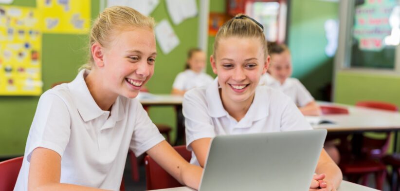 Students on a computer. | Newsreel