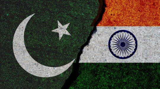 Pakistan and India flags. \ Newsreel
