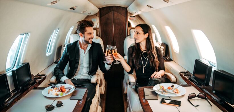 Couple in private jet. | Newsreel