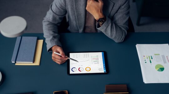 Businessman looking at reports.
