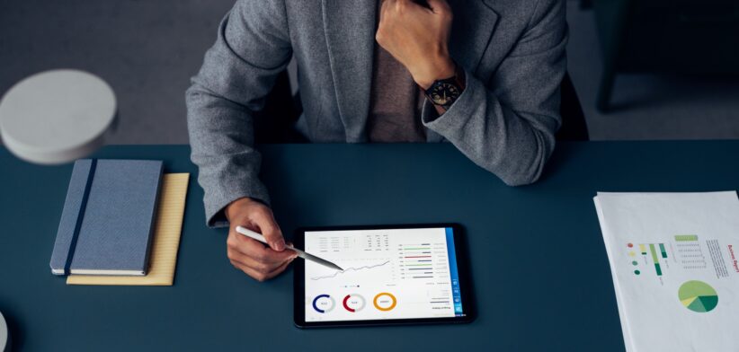 Businessman looking at reports.