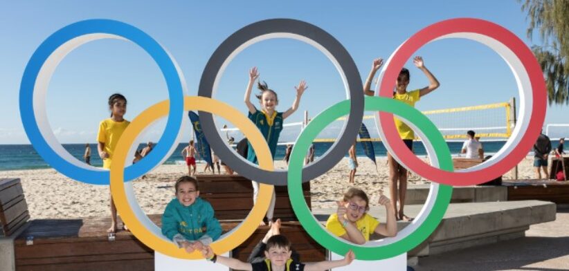 Children in Olympic rings.